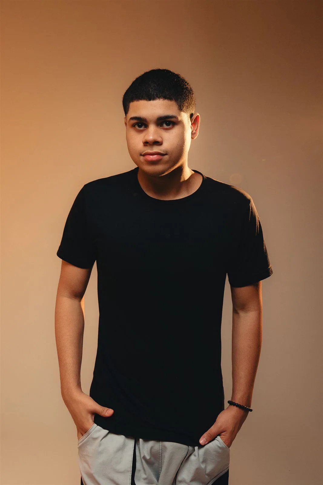 Person wearing an oversized drop-shoulder t-shirt