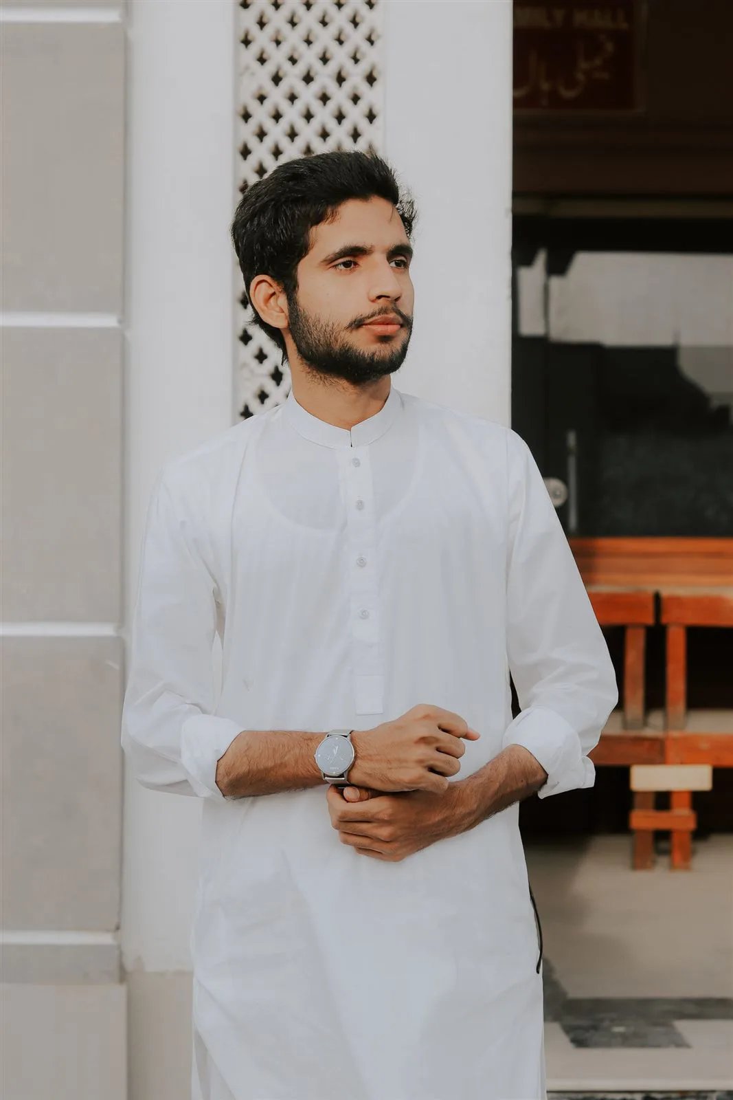 Man wearing a white cotton panjabi