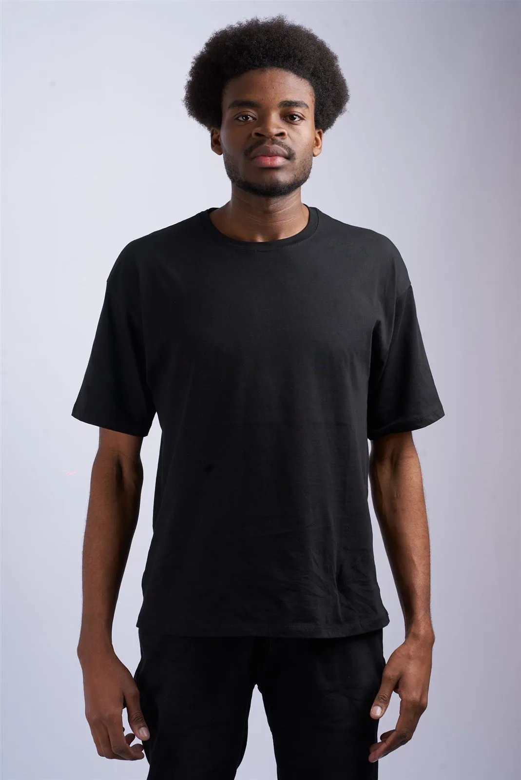 Man wearing a plain crew-neck t-shirt
